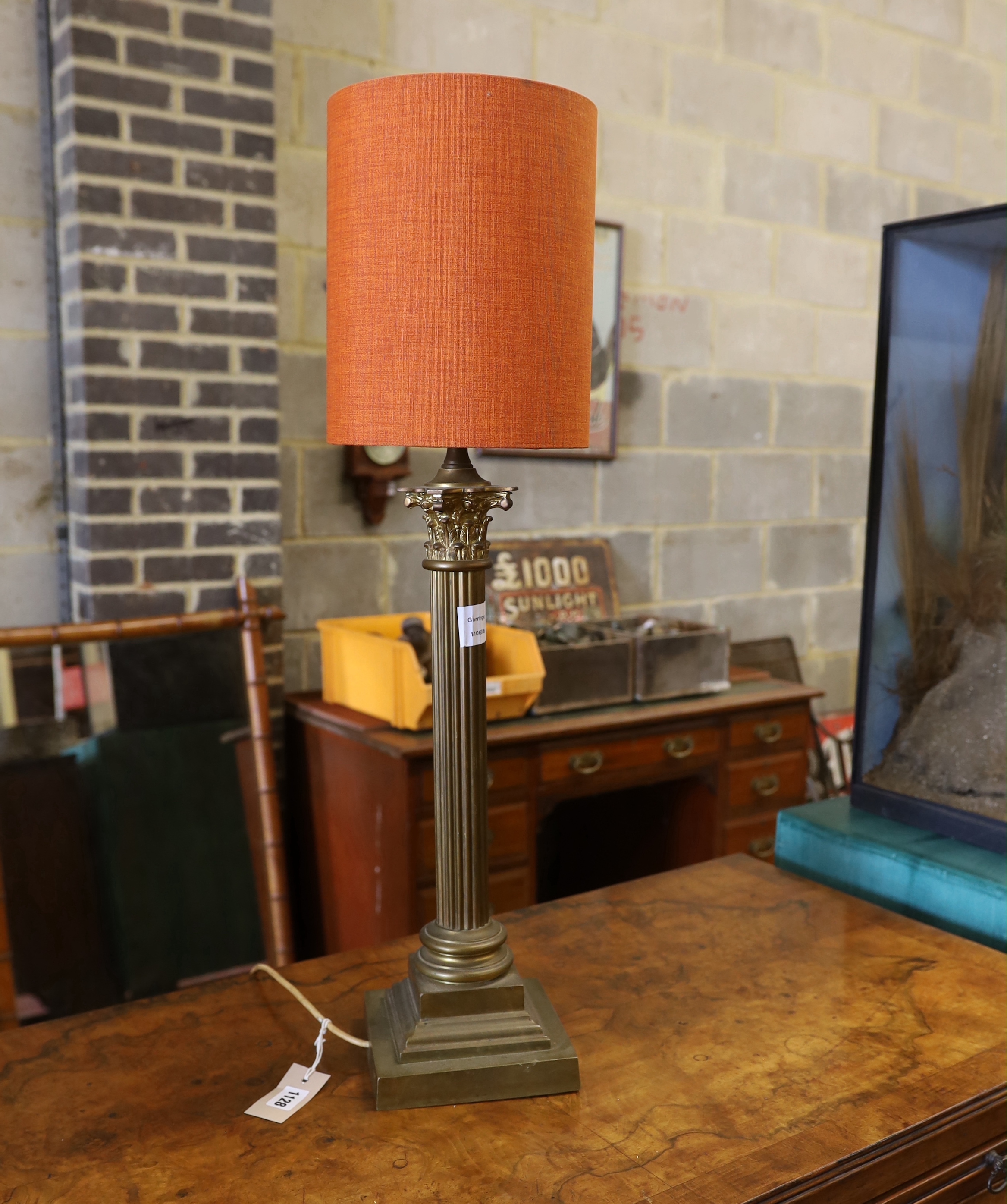 A brass Corinthian column table lamp, height including shade 76cm